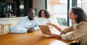 Real estate agent meeting with clients