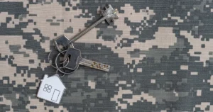 House key on camouflage fabric