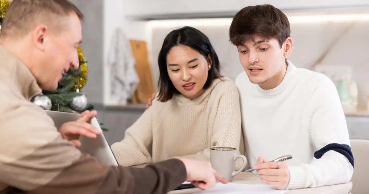 Couple meeting with agent
