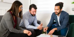 Agent talking to homebuyers